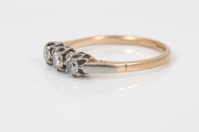 Lot 374 - 9ct gold diamond three stone ring
