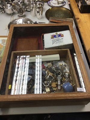 Lot 292 - Large display case and contents, including costume jewellery, watches, pen knives, etc