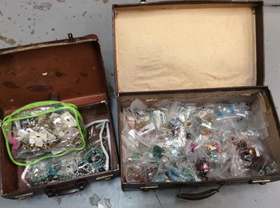 Lot 761 - Two vintage suitcases containing costume jewellery