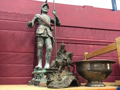 Lot 523 - Metal figure of a knight with a silver plate bowl