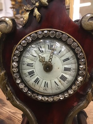 Lot 85 - Late 19th century French tortoiseshell shell veneered timepiece with cast gilt brass mounts and paste set bezel. 21cm