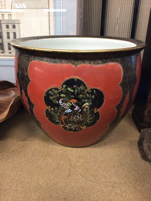 Lot 132 - Carlton Ware jardiniere, decorated with tropical birds on a red and gilt ground