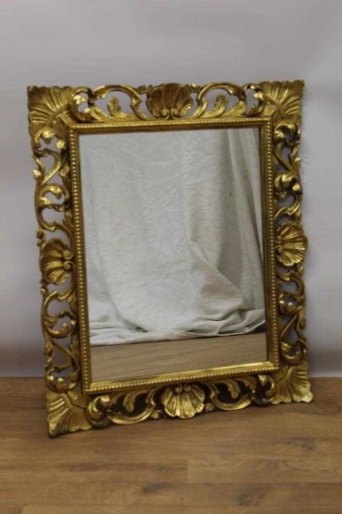 Lot 1485 - Ornate Florentine carved gilt mirror