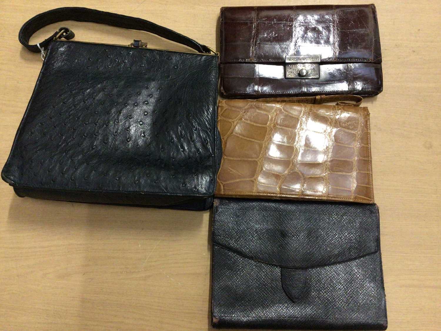 Lot 2097 - Ostrich feather fan, ostrich leather bag, crocodile leather bag with silver clasp and one other