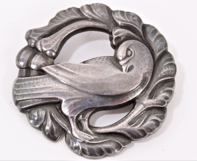 Lot 196 - Georg Jensen silver brooch of a bird with wreath surround