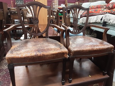 Lot 1064 - Pair of 1920's mahogany elbow chairs with leather seats and a pair of Victorian dining chairs