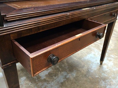 Lot 1034 - Early 20th century oak writing desk with tambour shutter