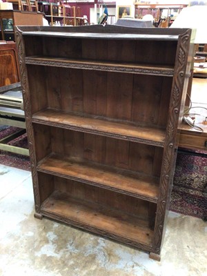 Lot 1040 - Carved oak bookcase