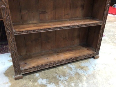Lot 1040 - Carved oak bookcase