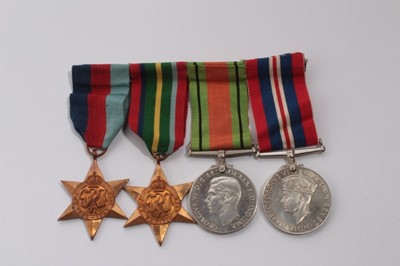 Lot 749 - Second World War medal group comprising 1939 - 1945 Star, Pacific Star, Defence and War medals (mounted on bar)