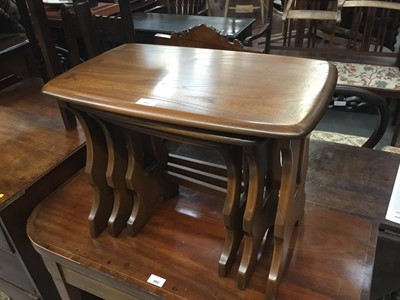 Lot 927 - Ercol elm nest of tables