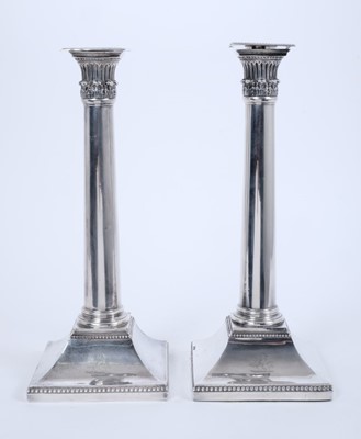 Lot 468 - Good pair Georgian white metal neoclassical style candlesticks with armorials