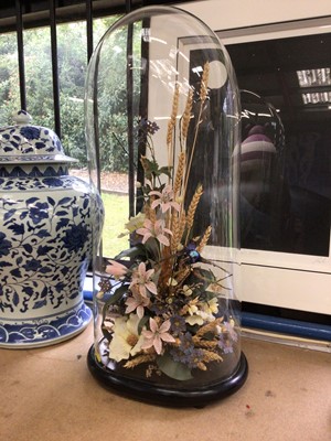 Lot 25 - Victorian glass dome containing bird of paradise and silk flower display