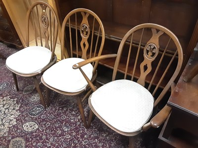 Lot 1059 - Five Ercol dining chairs together with a Piano stool (6)