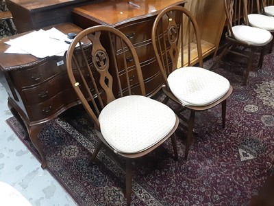 Lot 1059 - Five Ercol dining chairs together with a Piano stool (6)