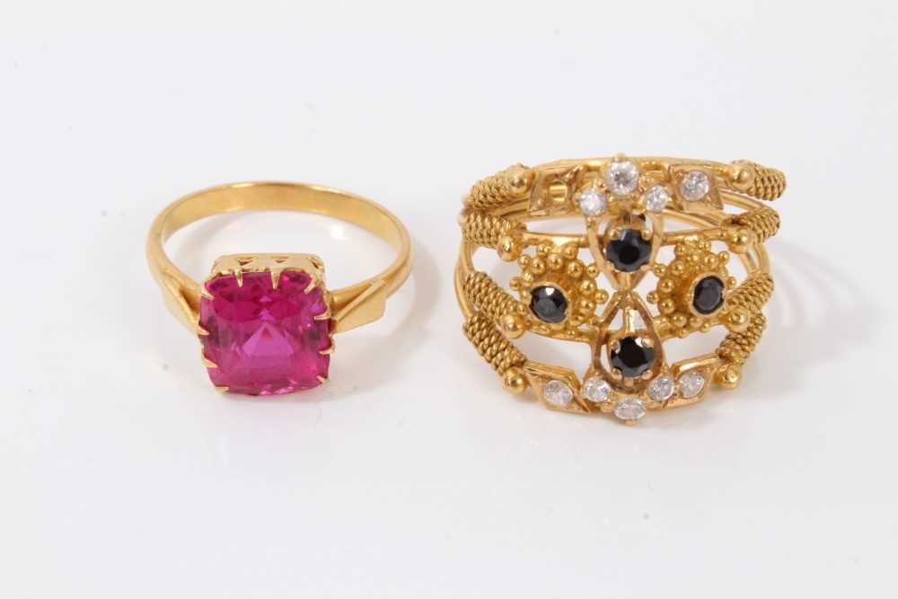 Lot 133 - Two Indian yellow metal gem set dress rings