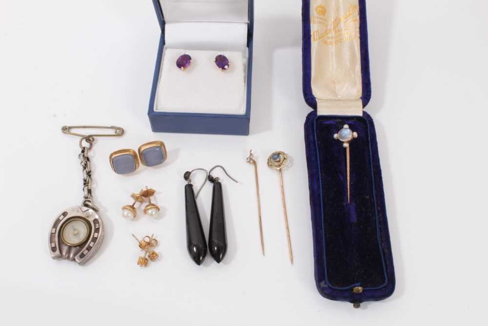 Lot 135 - Edwardian moonstone and seed pearl stick pin, two other stick pins, Victorian silver novelty horseshoe compass fob and earrings