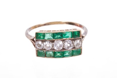 Lot 547 - Art Deco emerald and diamond three row ring