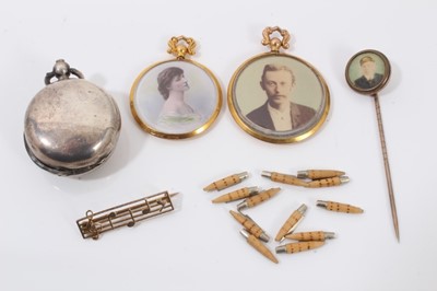 Lot 203 - Two Edwardian lockets, stick pin, 9ct gold music bar brooch and silver sovereign holder