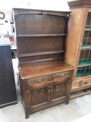 Lot 1024 - Oak two height dresser with two drawers and two carved panelled doors below, 91cm wide, 42cm deep, 167.5cm high