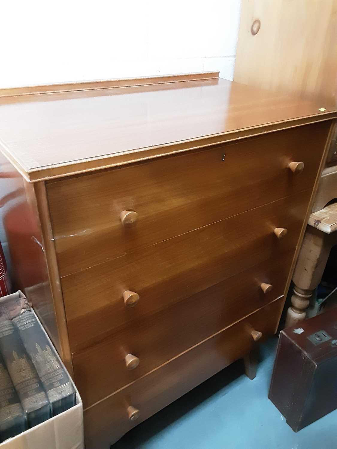 Lot 1128 - Teak of four drawers on square tapered legs