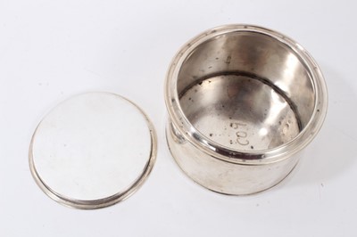Lot 147 - George V silver tea caddy/ biscuit box in the form of a paint tin, the top engraved 'JMB from RW. 1922' London 1921, maker Goldsmiths & Silversmiths Company, 13cm in diameter