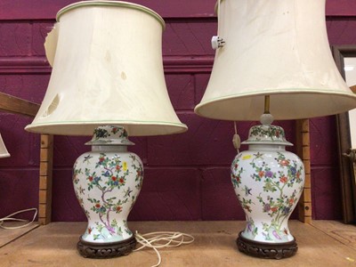 Lot 506 - Pair of Chinese style table lamps on pierced wooden bases