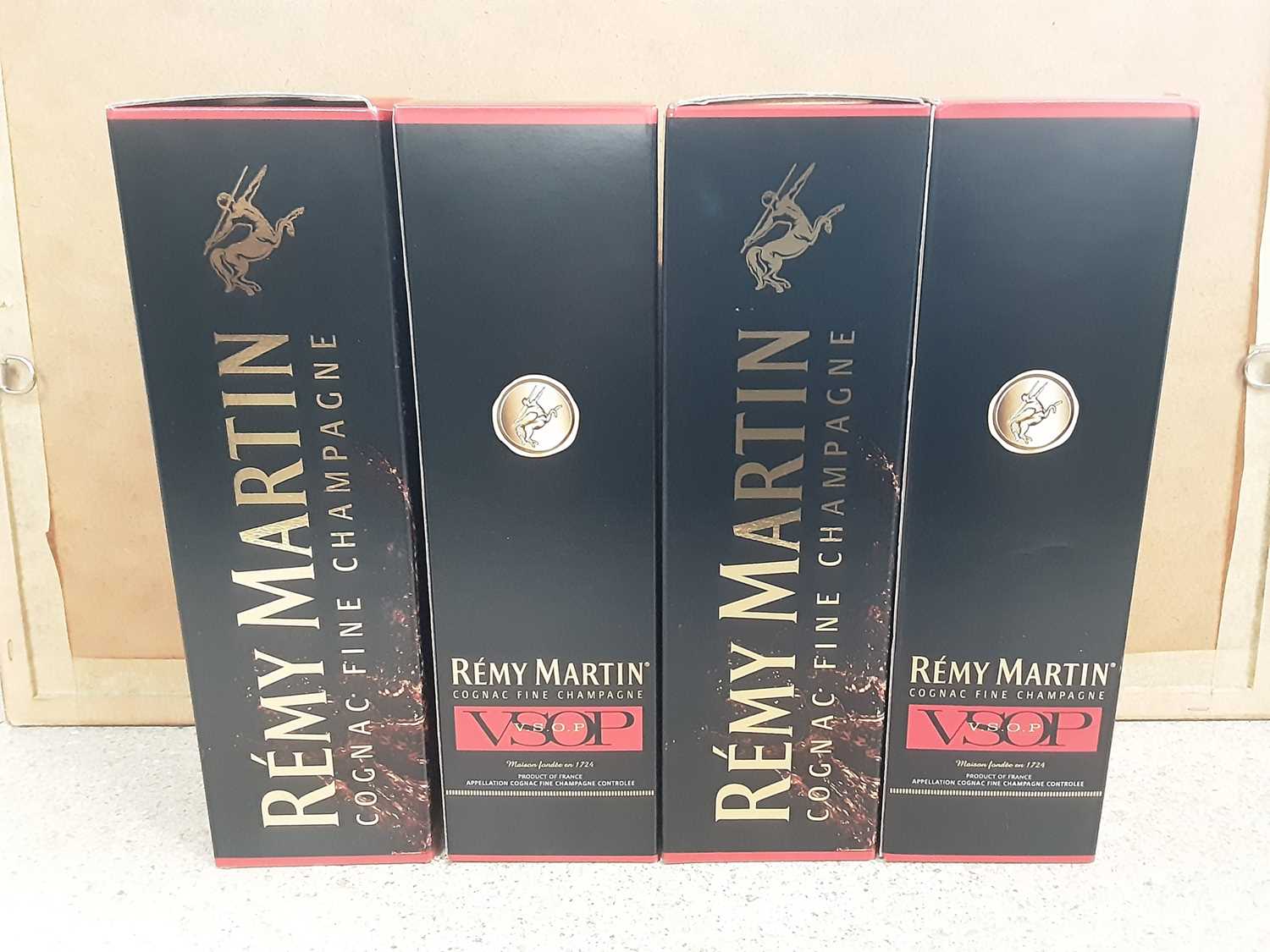 Lot 11 - Four bottles of Remy Martin Cognac Fine Champagne 70cl, in original boxes