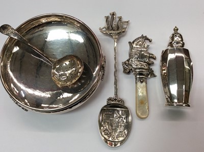 Lot 713 - Mr Punch silver rattle with mother of pearl handle, continental silver spoon and other silver plated ware