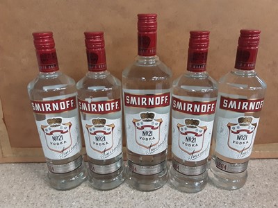 Lot 17 - Four bottles of Smirnoff Vodka 70cl together with a 1 litre bottle (5)