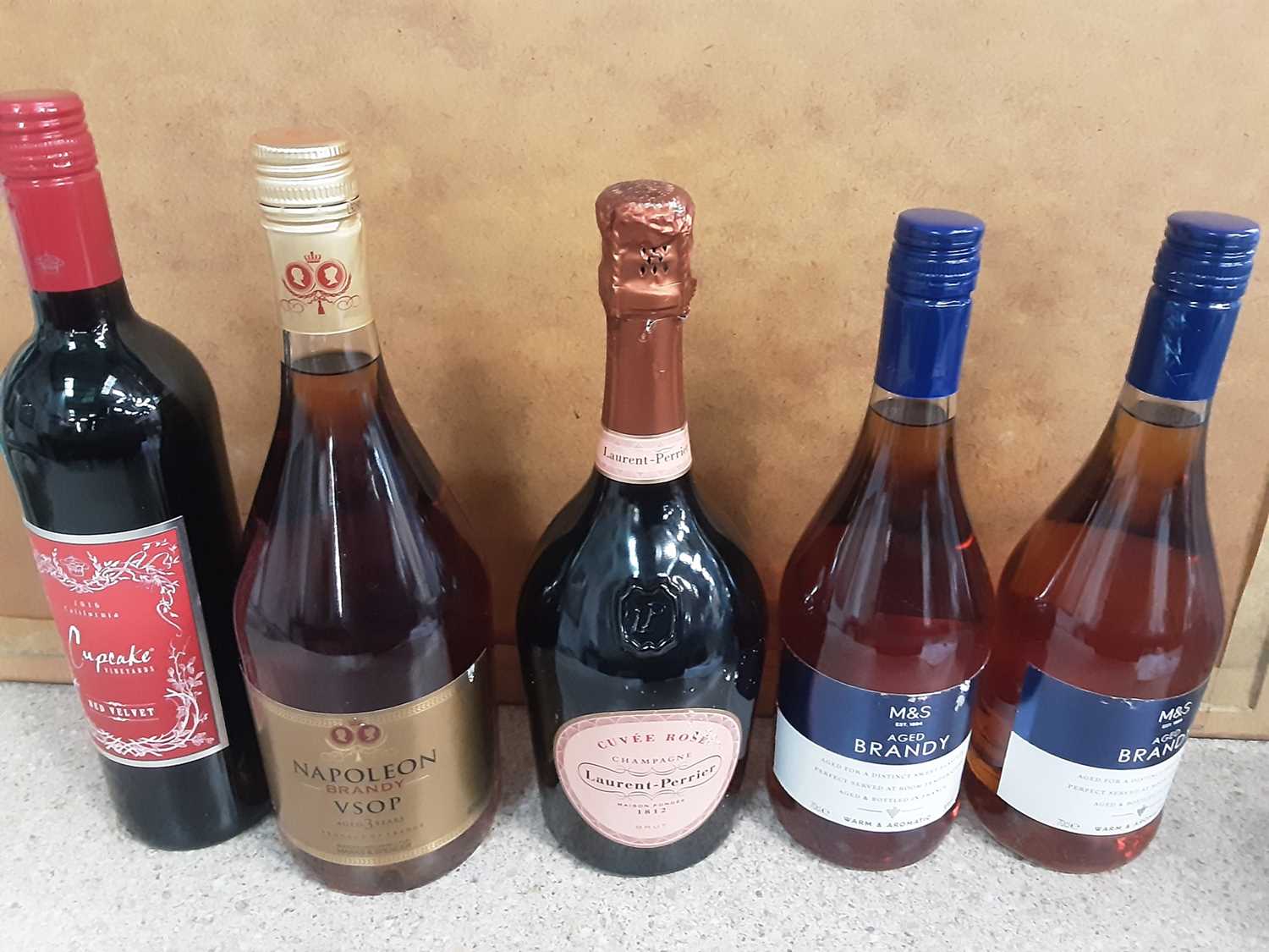 Lot 21 - Bottle of Laurent-Perrier Champagne, 1 litre bottle of Napoleon VSOP Brandy, two other bottles of brandy and a bottle of red wine (5)