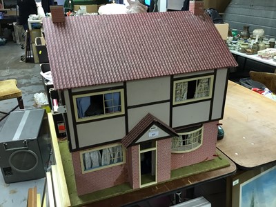 Lot 437 - Dolls house and contents