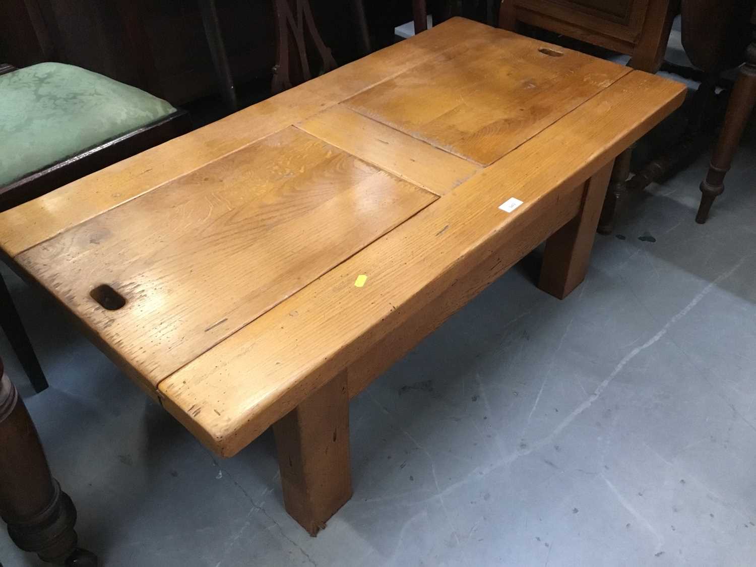 Lot 949 - Heavy pine coffee table with sliding panels