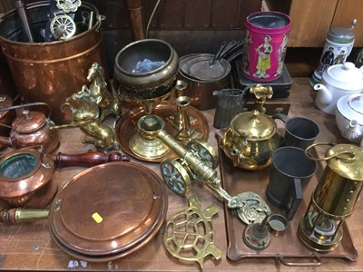 Lot 495 - Two copper warming pans, copper kettles, brass miners lamp and other copper, brass and metalware