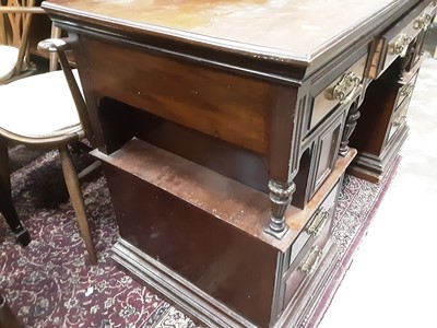 Lot 1063 - Late Victorian walnut kneehole desk with drawers and cupboards below, 126.5cm wide, 55cm wide, 83cm high