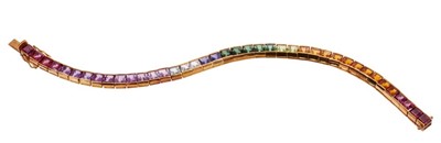 Lot 572 - 18ct yellow gold and multi-gem line bracelet