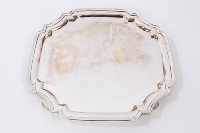 Lot 145 - Contemporary silver salver of square form, raised on four feet, Sheffield 1979, maker Poston Products Ltd