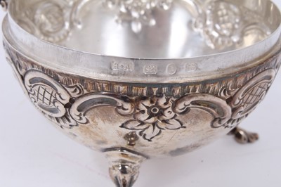 Lot 146 - Victorian silver pot pourri dome of spherical form with embossed decoration, pierced hinged cover, raised on three feet