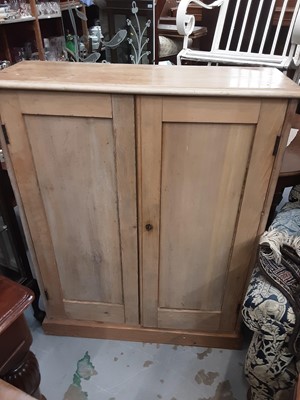 Lot 1072 - Old pine cupboard with shelved interior enclosed by two panelled doors, 98cm wide, 35cm deep, 123cm high