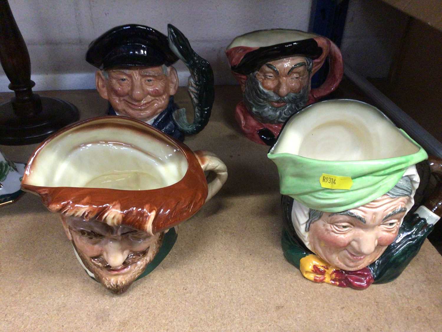 Lot 39 - Four Royal Doulton character jugs - Drake, Sarey Gamp, Falstaff and Lobster Man