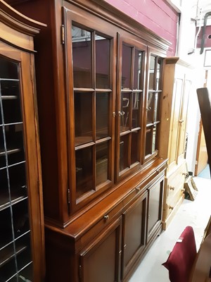 Lot 1083 - Good quality reproduction two height bookcase/unit with shelved interior enclosed by three glazed doors, with three drawers and three cupboards below, 168cm wide, 47cm deep, 211cm high