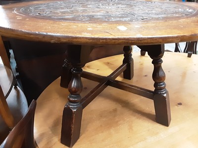 Lot 1098 - Good quality oak coffee table with carved circular top on turned and block legs joined by x frame stretchers, 78cm diameter, 41.5cm high
