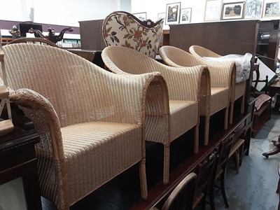 Lot 1103 - Set of four good quality Lloyd Loom Eastward wicker chairs and a matching coffee table (5)