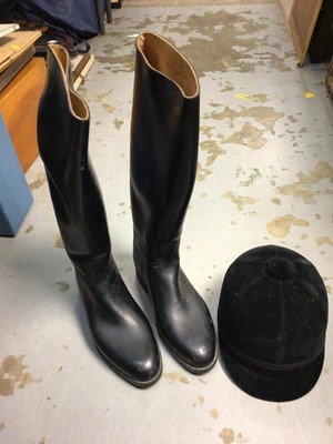 Lot 372 - A riding hat, leather riding boots and three fur jackets