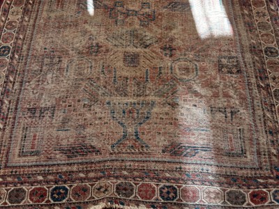 Lot 1109 - Eastern rug with geometric decoration on red, blue, and beige ground, 188cm x 142, plus another similar rug