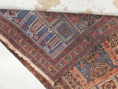 Lot 1110 - Eastern rug with geometric decoration on red and blue ground, 131cm x 80cm and one other runner, 127cm x 38.5cm