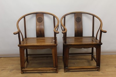 Lot 1360 - Good pair of antique Chinese hardwood horseshoe armchairs