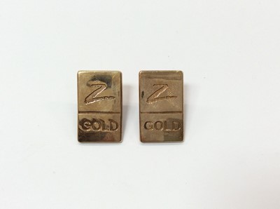 Lot 711 - Pair 9ct gold pin brooches