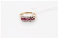 Lot 1602 - Gold (9ct) ruby and diamond ring with five...