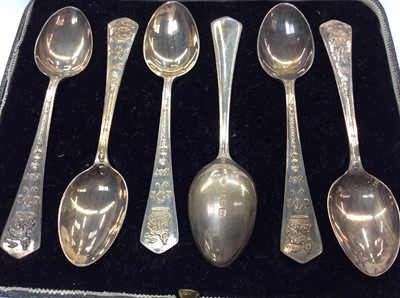 Lot 730 - Set six silver Royal Commemorative teaspoons in fitted case and small silver two handled trophy on stand